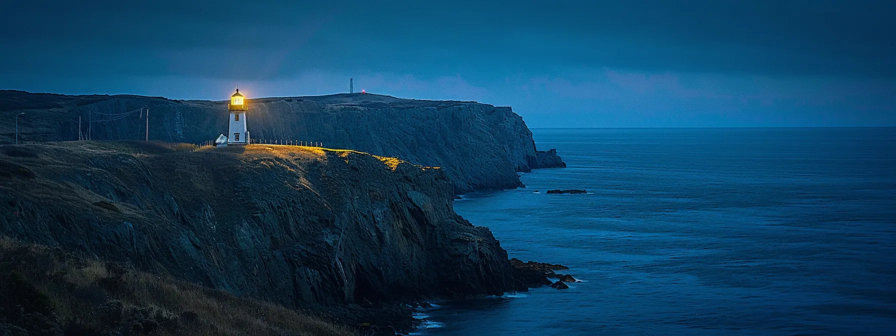 a modern navigational beacon illuminates the rugged cliffs where the historic terrible tilly lighthouse once stood, symbolizing the enduring legacy of maritime safety. a modern navigational beacon illuminates the rugged cliffs where the historic terrible tilly lighthouse once stood, symbolizing the enduring legacy of maritime safety.
